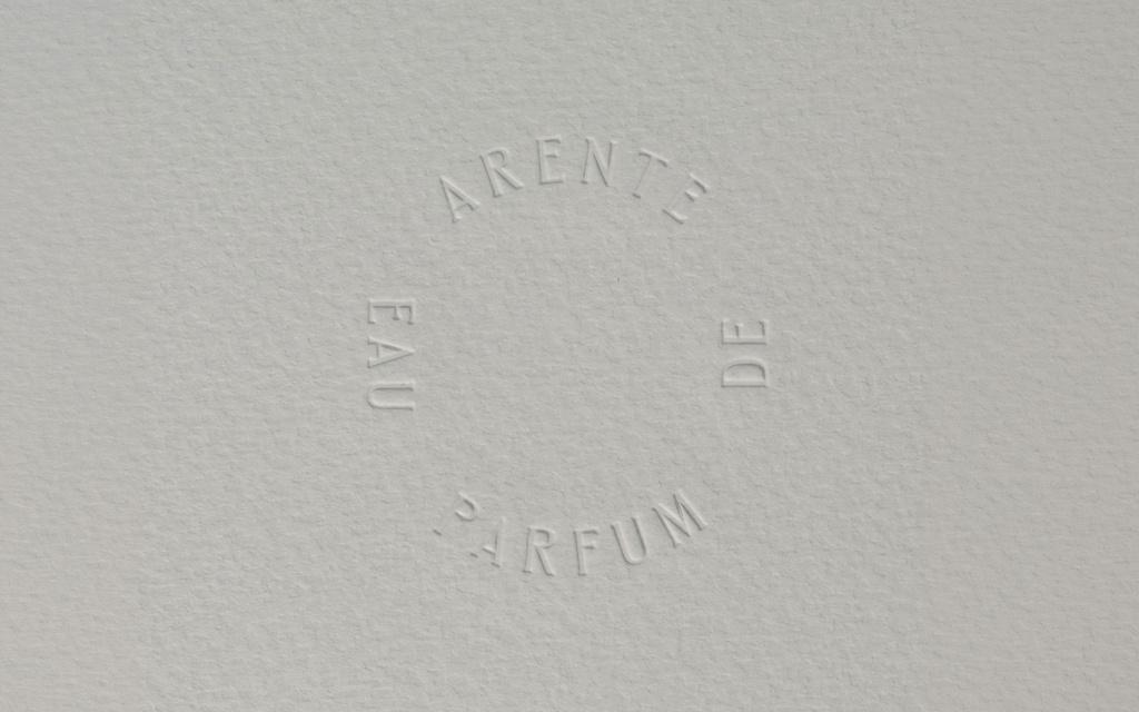 Blind embossed logo on structured paper