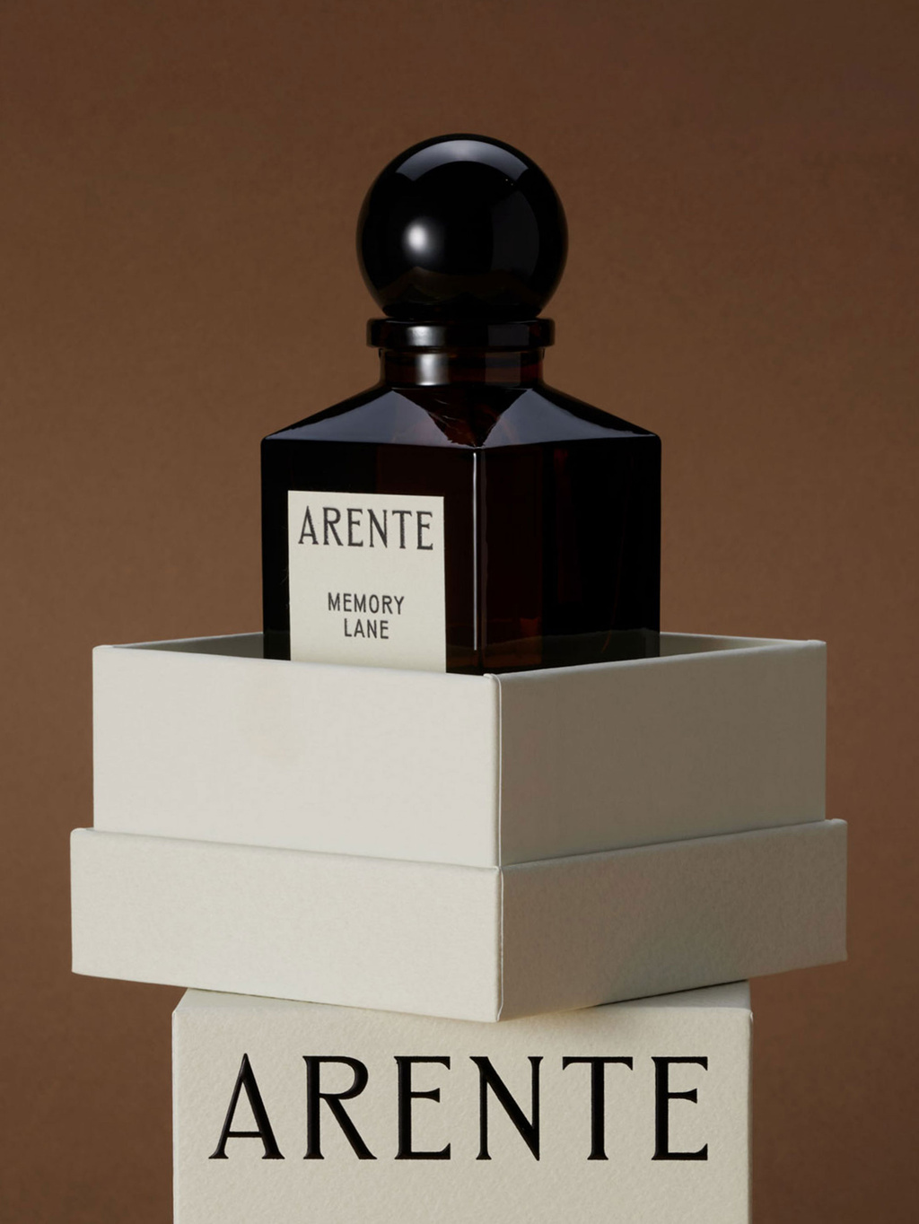 Perfume bottle in partly opened box