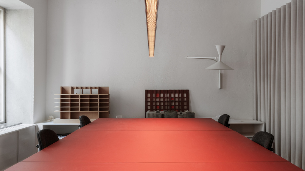 Office with a big red desk