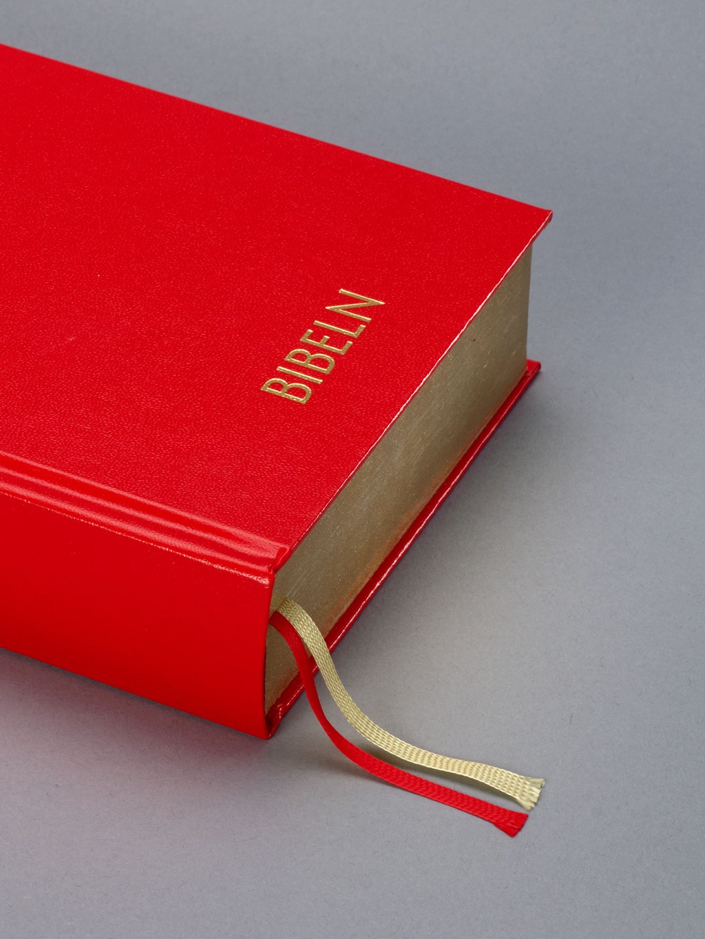 The classic red Bible with gilt edges.