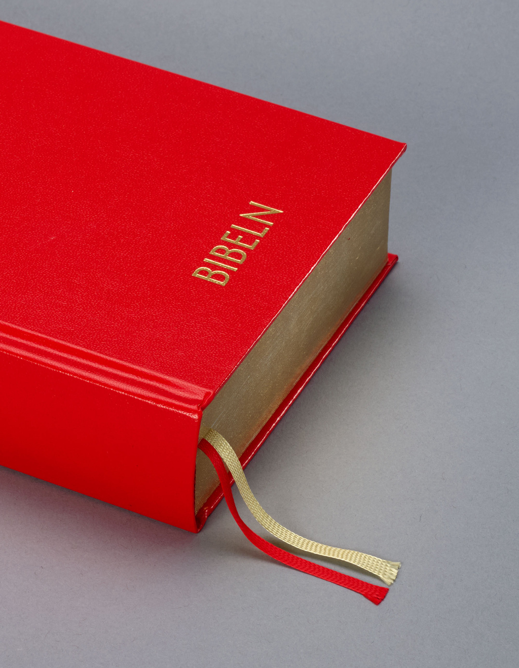 The classic red Bible with gilt edges.