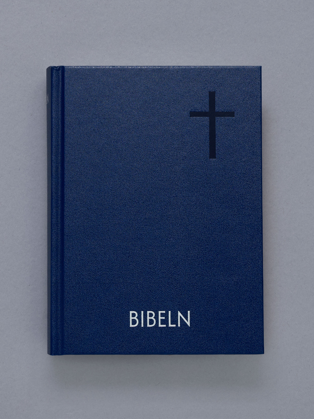 Dark blue Bible.